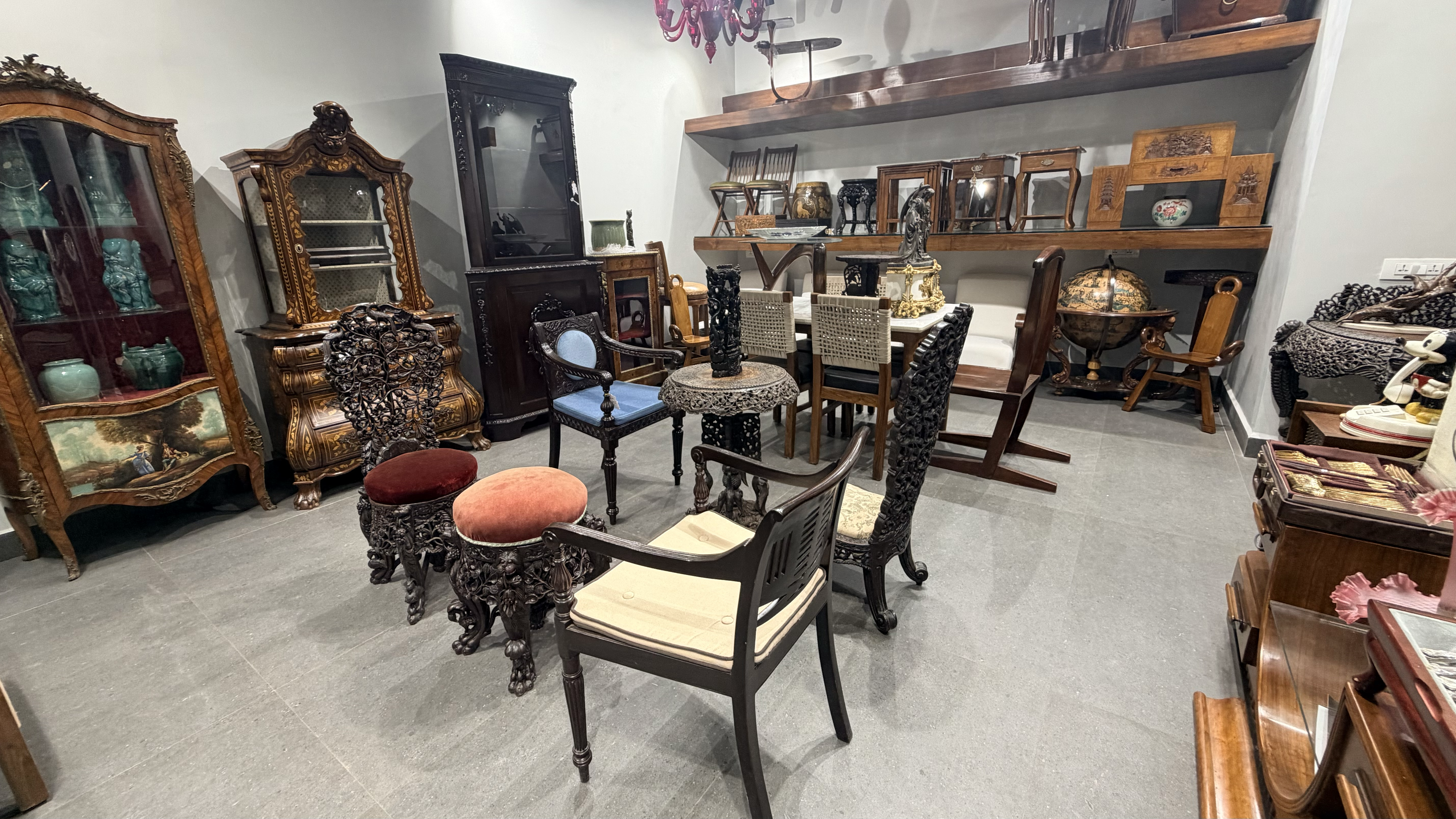 Vinterior showroom — carved cabinets, colonial chairs and heritage collectibles